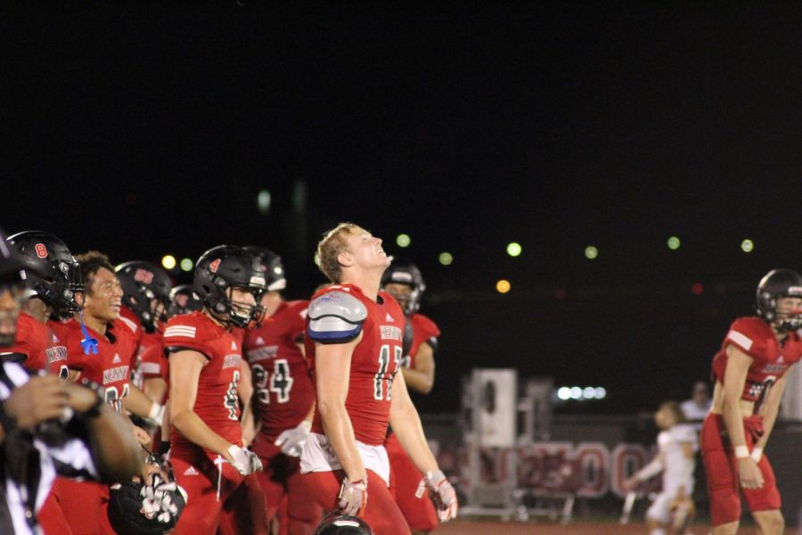 Sophomore Liam Moore smiles in victory as the Crusaders win their first game of the season.