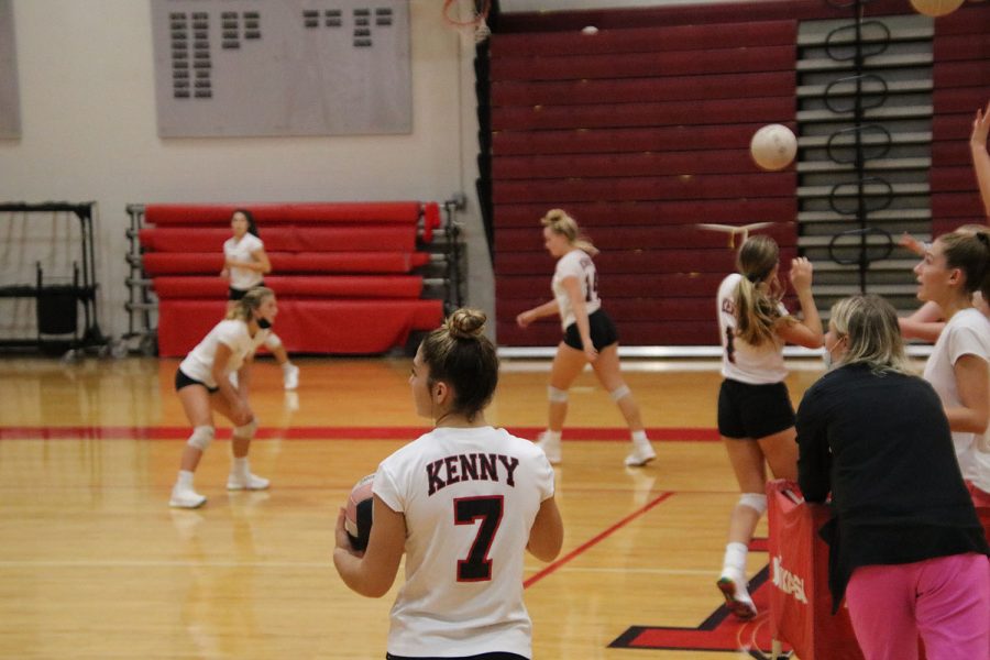 The Varsity team warms up before the game.