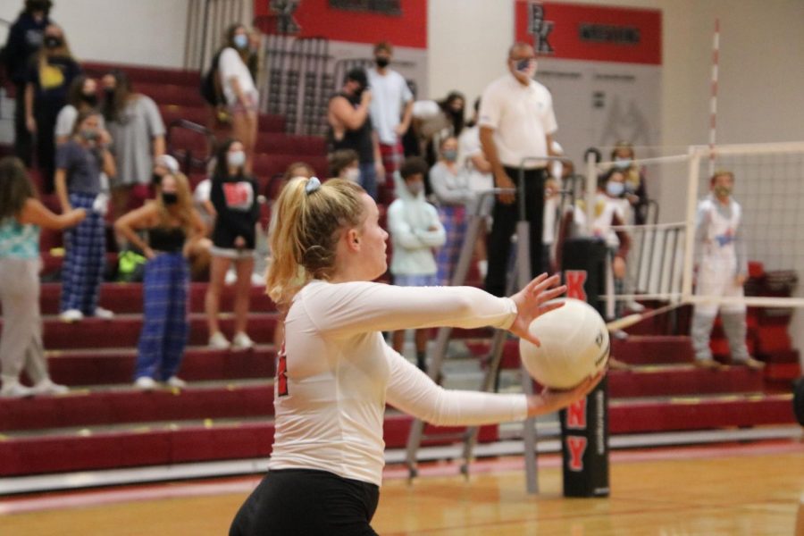 Senior Emilie Chinault prepares to spike the ball.