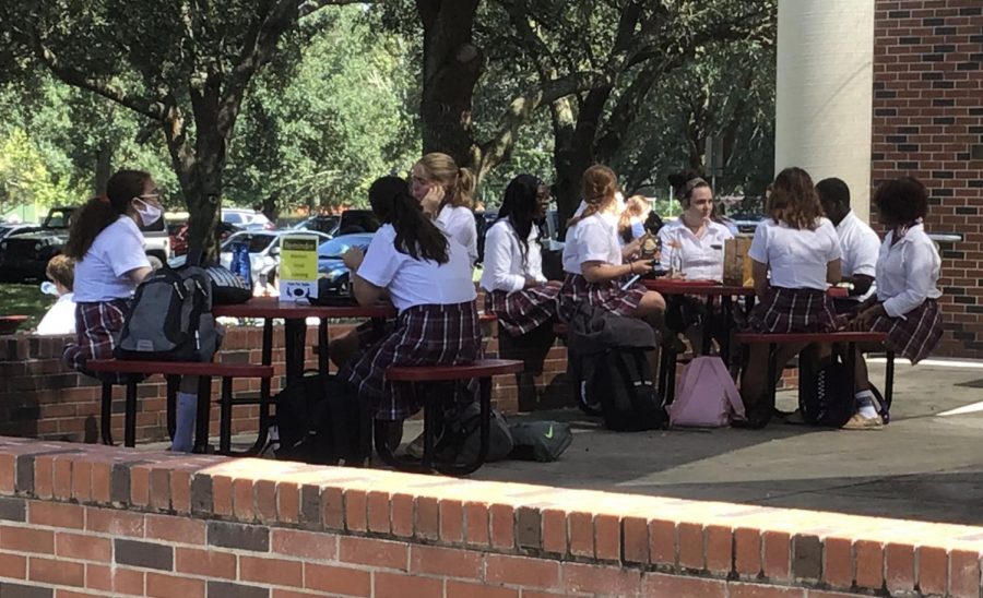 Fewer juniors and senior sit on the “Junior-Senior” patio.