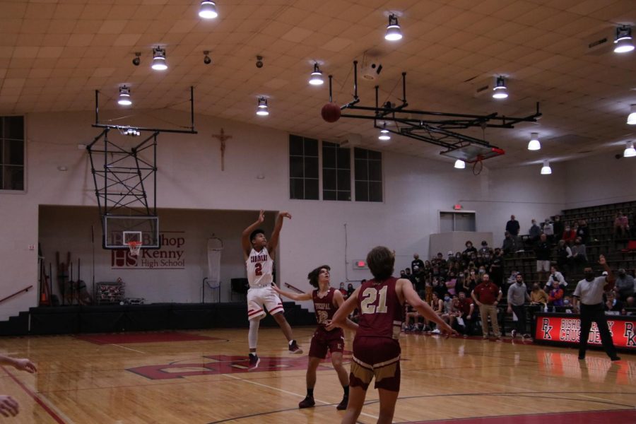 Senior Stevie Dionisio shoots and makes a three pointer.