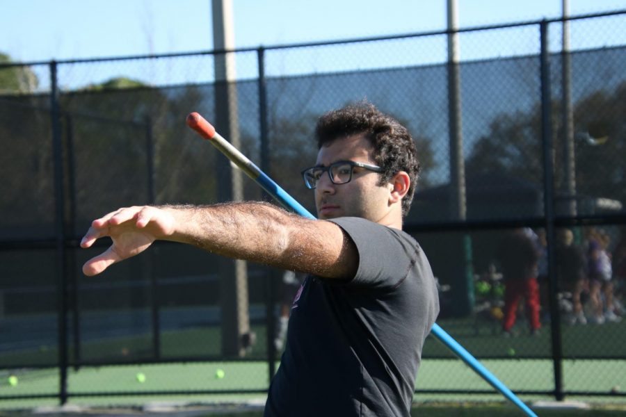 Senior Nick Rukab preparing to throw the javelin across the field during practice. 