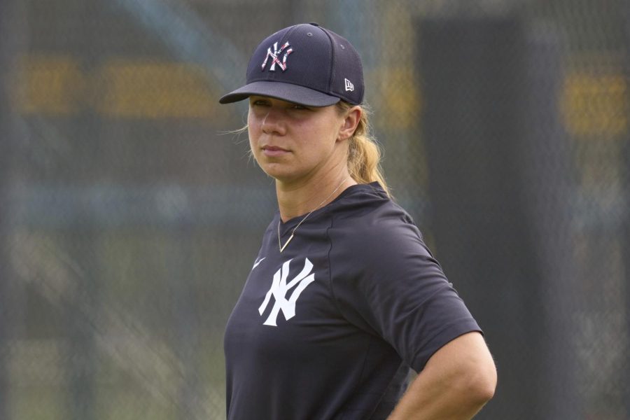 Balkovec on the third baseline as a base coach (photo courtesy of NY Post).