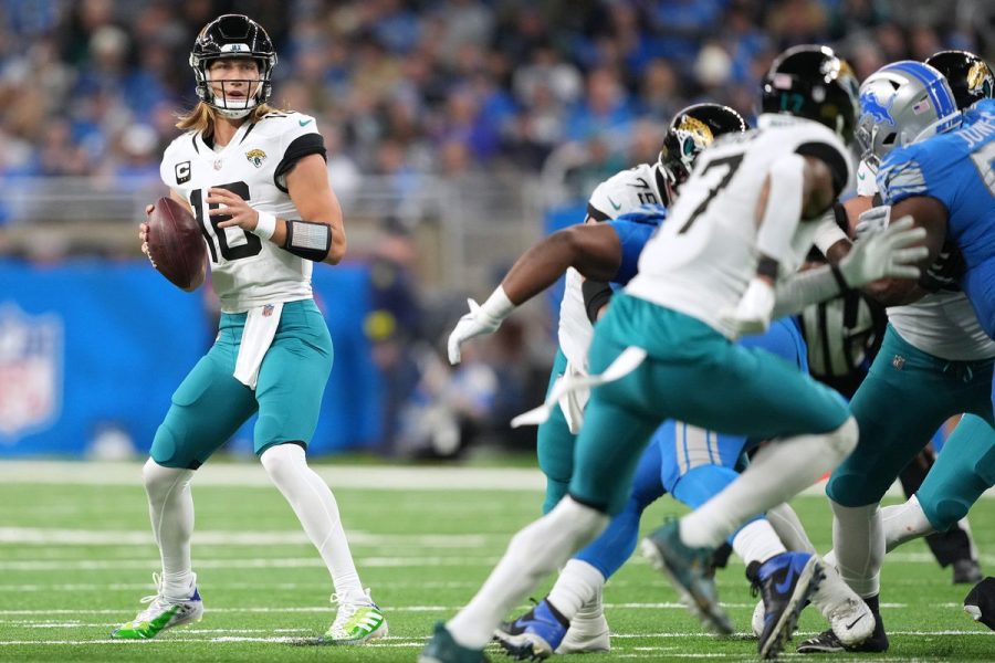 Lawrence looks toward the end zone to throw his one and only touchdown of the game. (Photo Courtesy of Big Cat Country)