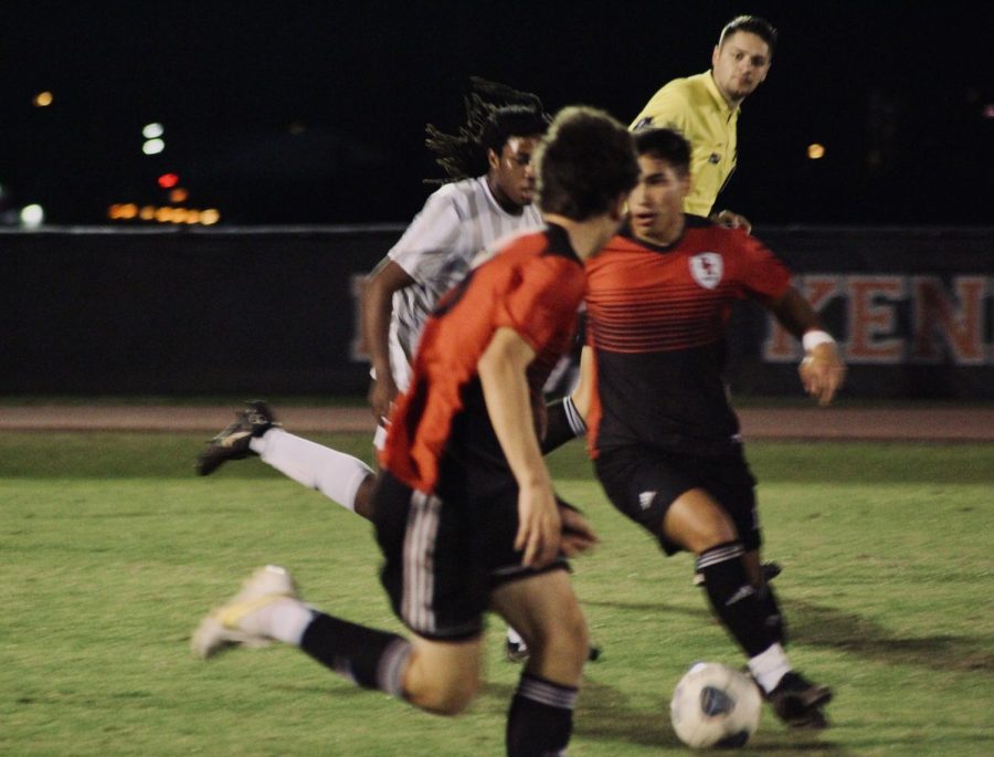 Senior Andy Ledesma passes the ball.