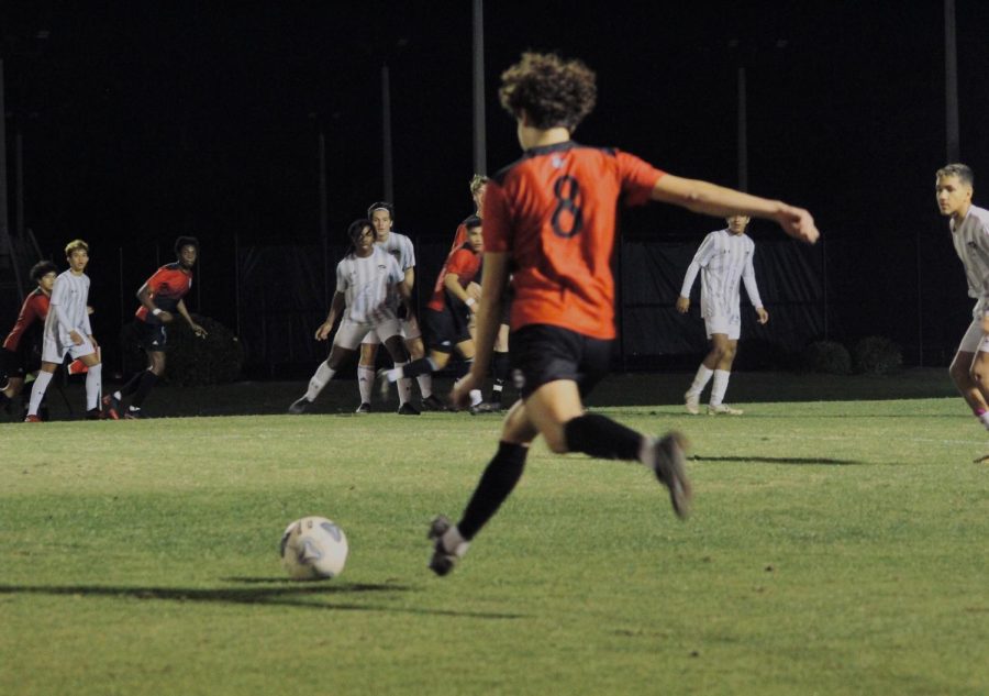 Senior Joseph Jimenez prepares to kick. 