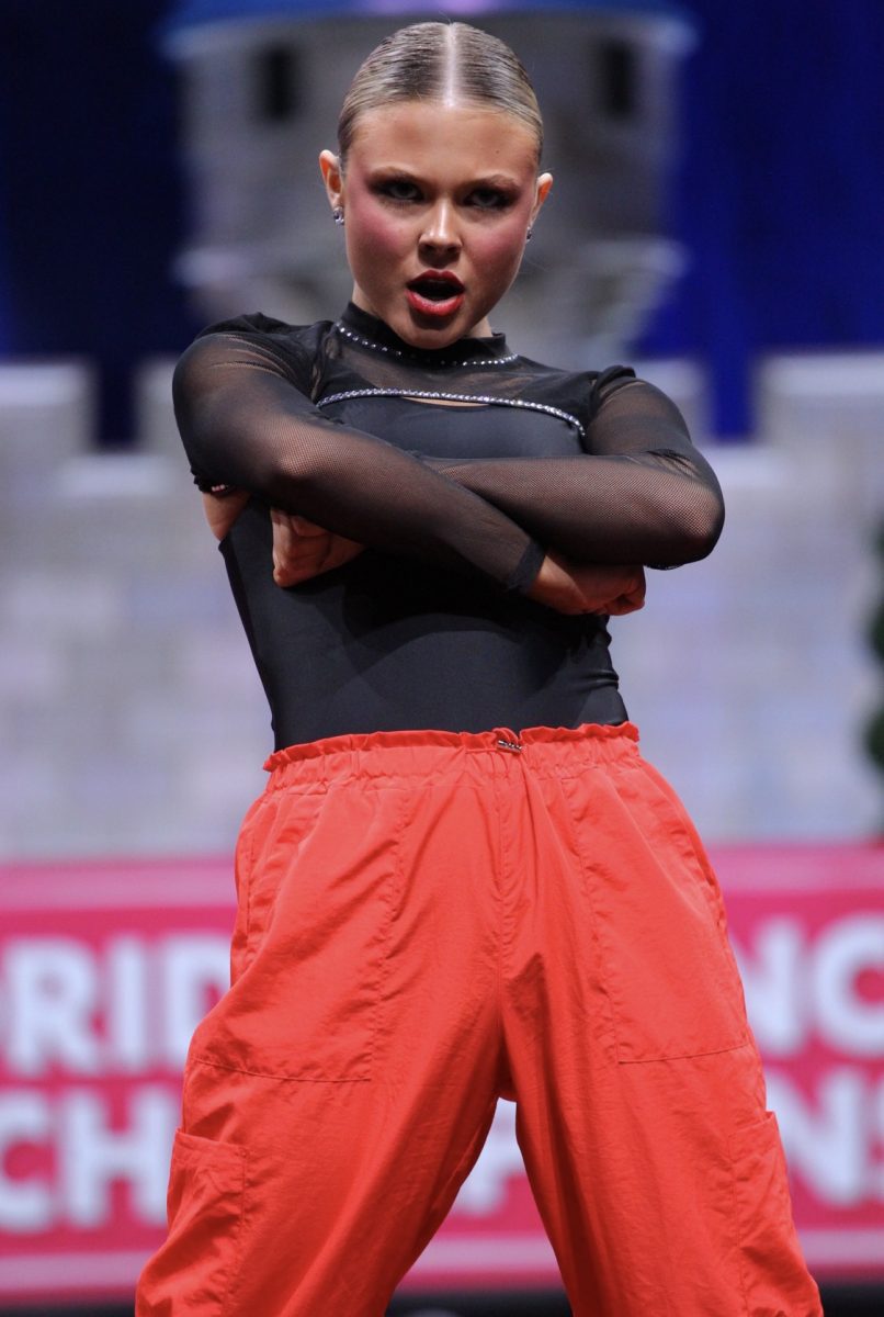 Junior Lorelei Carlton gets close up shot as she hits ending pose