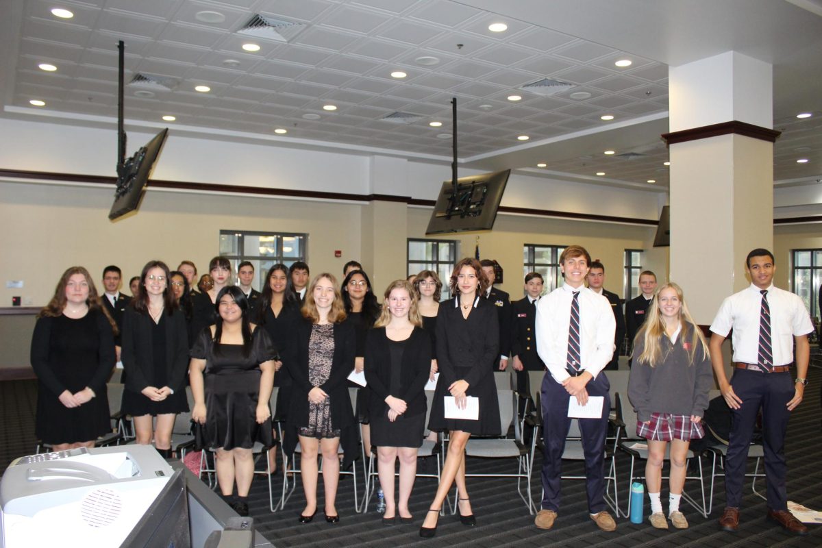 Choir and student council gather for a photo before the ceremony begins.
