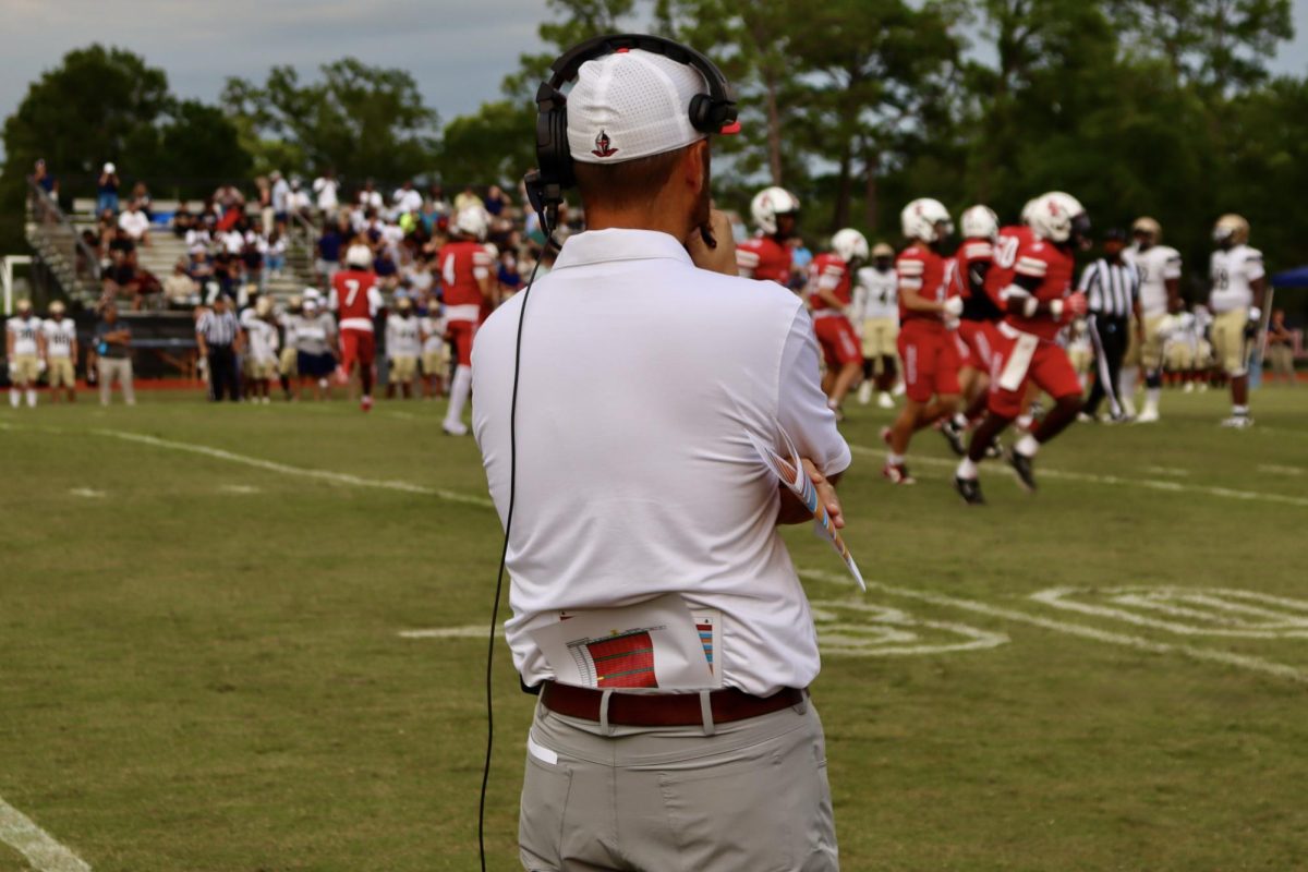 Coach Krause lead the football team to a 21-20 victory on August 29, against University Christian.
