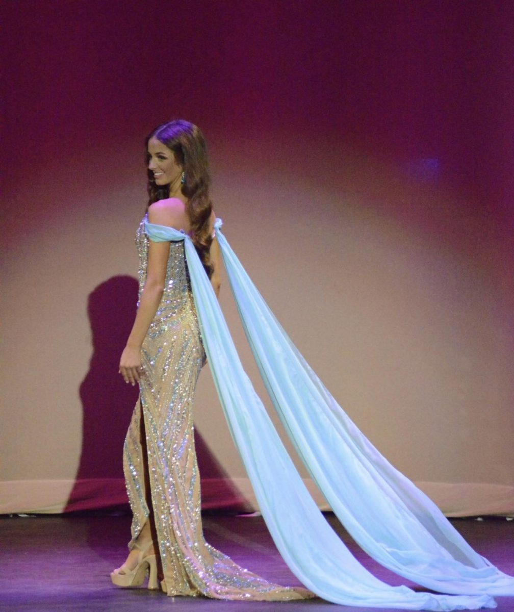 Sheridan Delegal showcases her dress from C&D pageantry, dressed by Cathy.