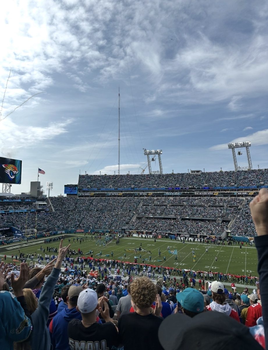 Jaguar fans celebrate the final moments in the original stadium following the loss to the Bills.
