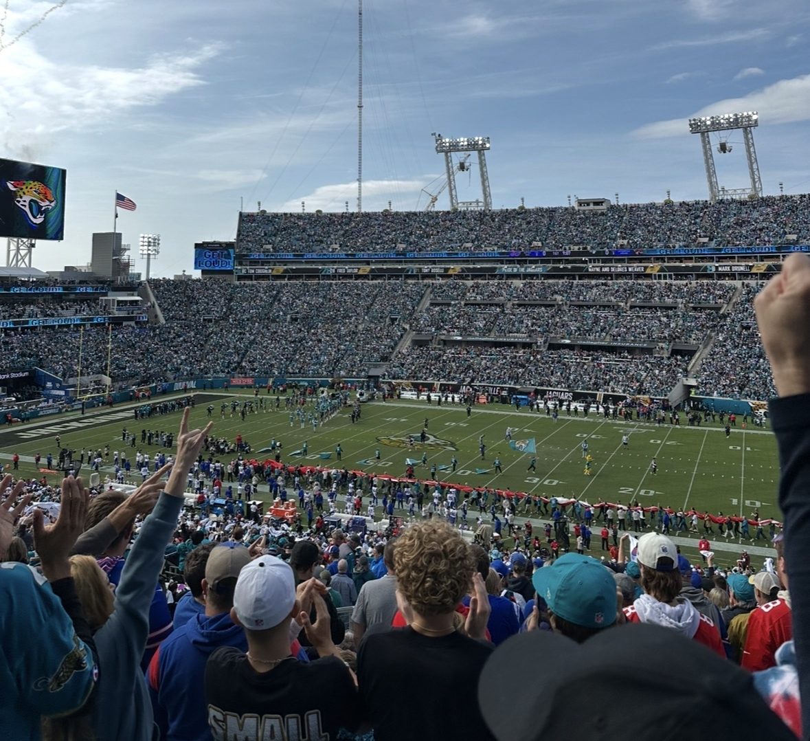 Jaguar fans celebrate the final moments in the original stadium following the loss to the Bills.