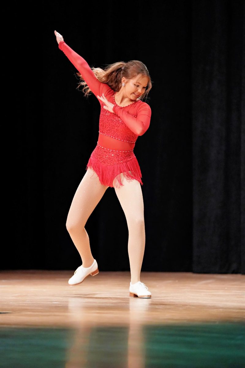 Contestant #3, Seanna Mead, performs as tap dance to "Footloose" by Kenny Loggins for her talent.