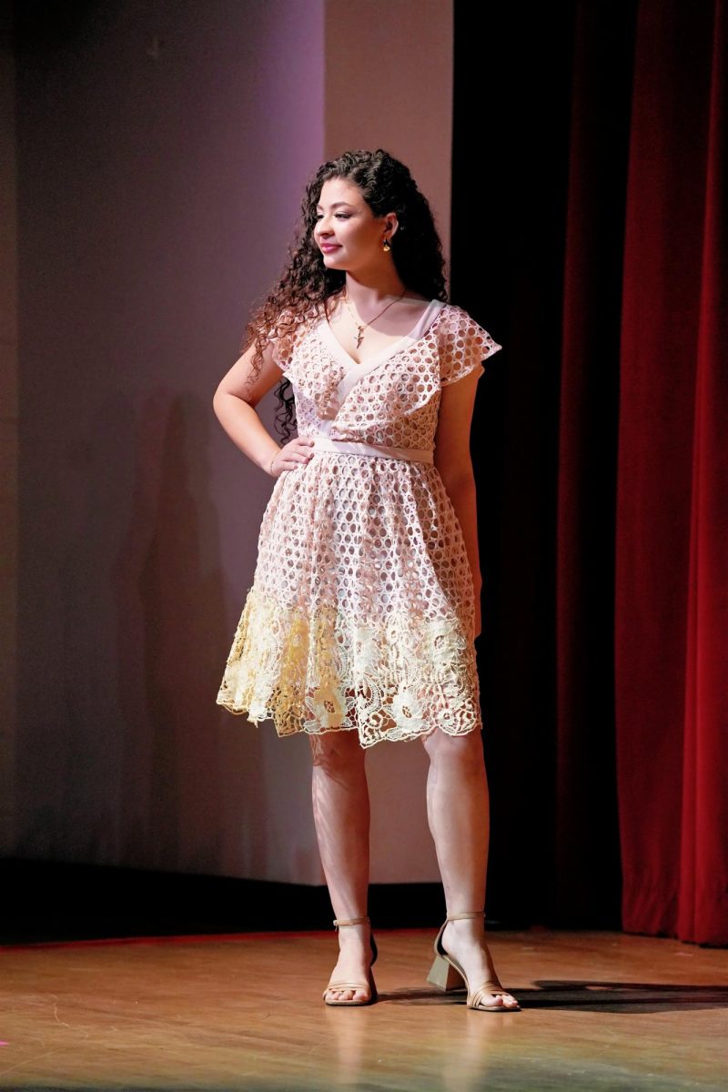 In a sweet summery dress, Michelle Santa Barbara models her casual wear.
