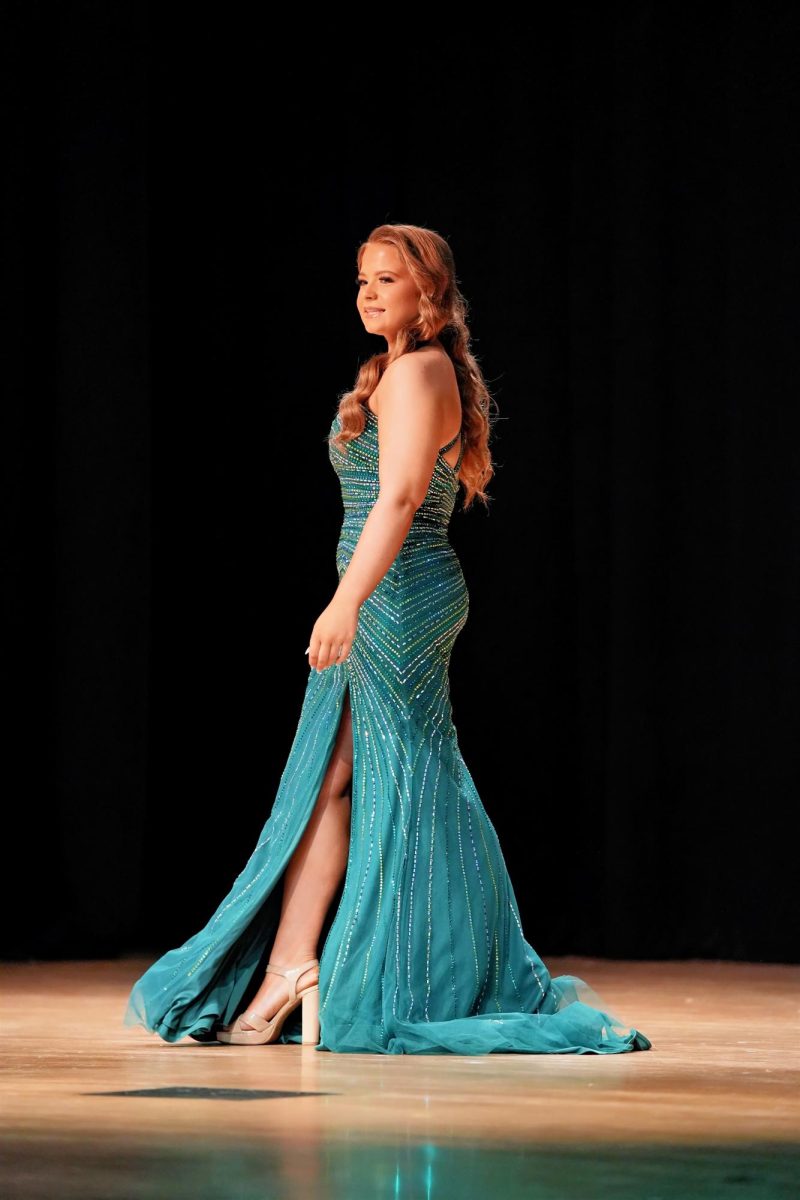 In the formalwear segment, Rebekah Jones wears a one-shoulder green gown. 