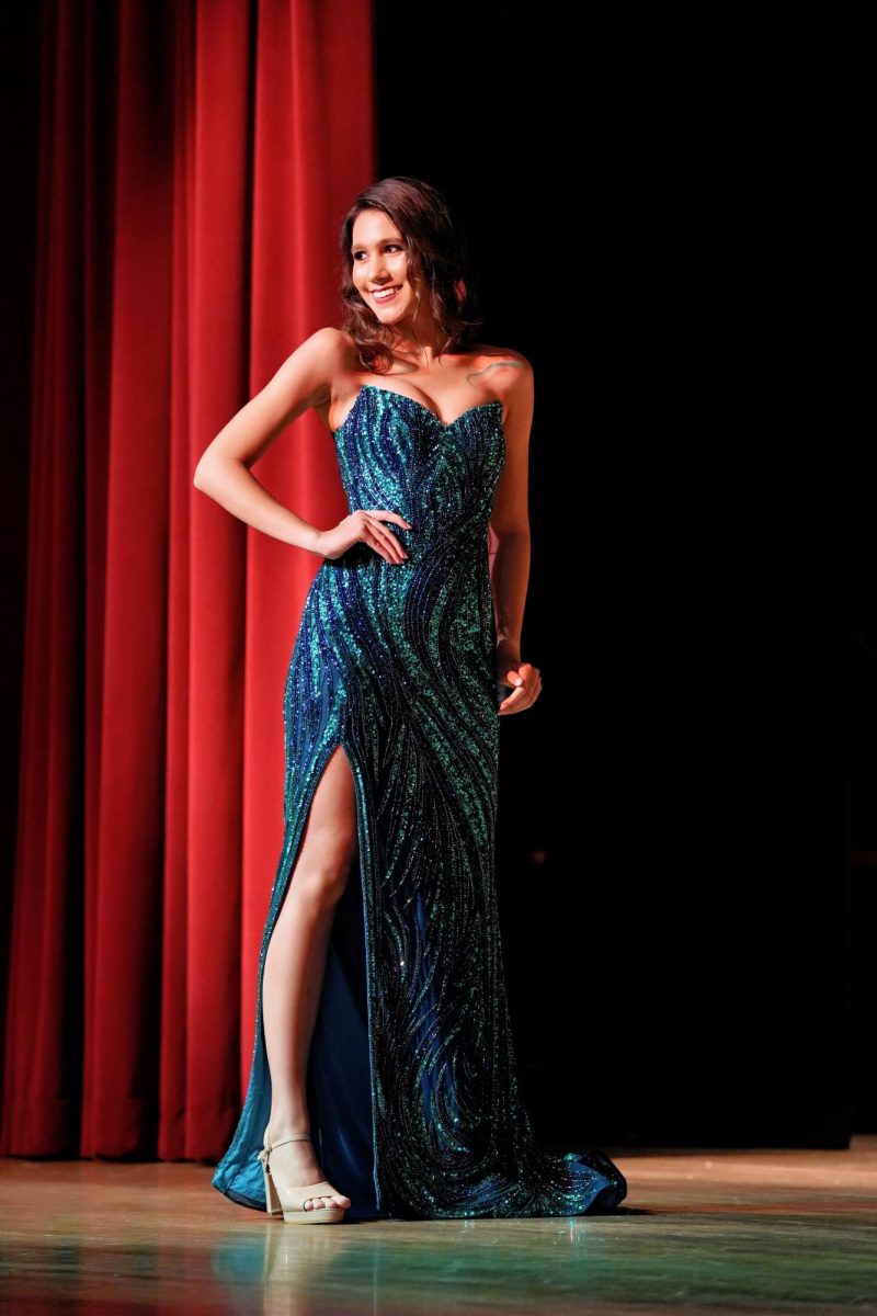 In the formalwear portion of the pageant, Carolina Bettega Feitoza models a strapless beaded gown.