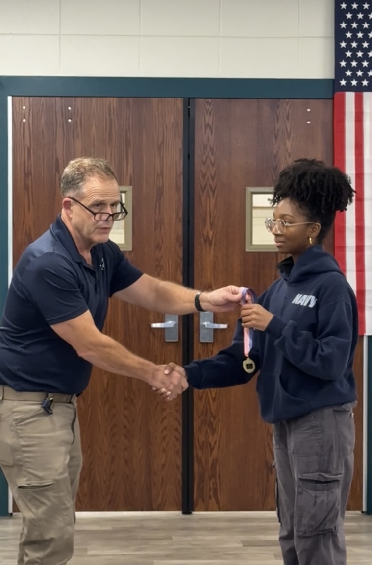 Wynn receives the Area 10 Top Shooter award for NJROTC Air rifle. 