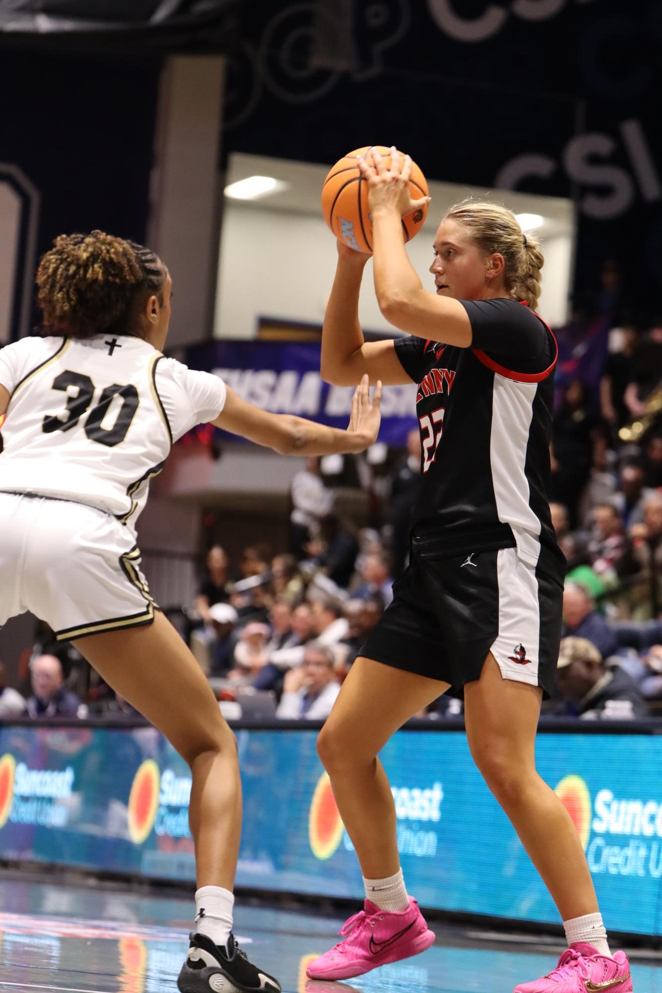 Junior Kathleen Crawley prepares to pass the ball off to teammate on Thursday March 12, 2026 at the girls class 4A State Championship.